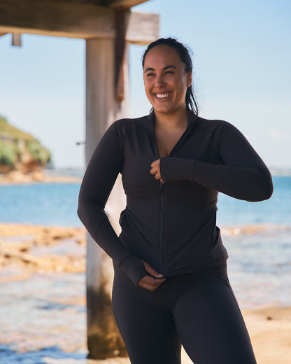 Woman wearing Womene Moments Zip Jacket in Coffee Brown — Australian training jacket