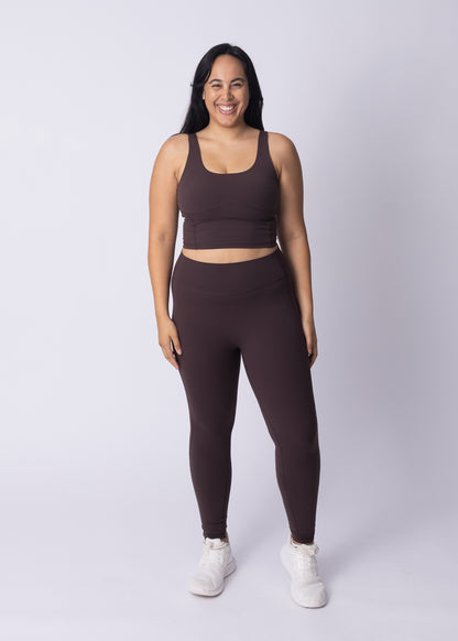 Woman wearing Moments High Waisted Leggings with Moments Longline Sports Bra — full Womene activewear set