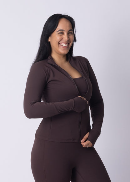 Woman wearing Moments Zip Jacket with Moments Leggings — full Womene activewear set