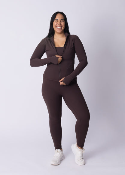 Woman wearing Womene Moments Zip Jacket in Coffee Brown — Australian training jacket