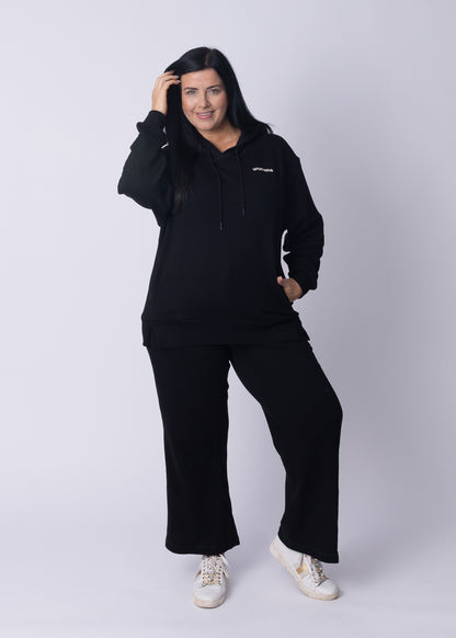 Close-up of ribbed cuff and heavyweight cotton detail on Moments Cozy Hoodie