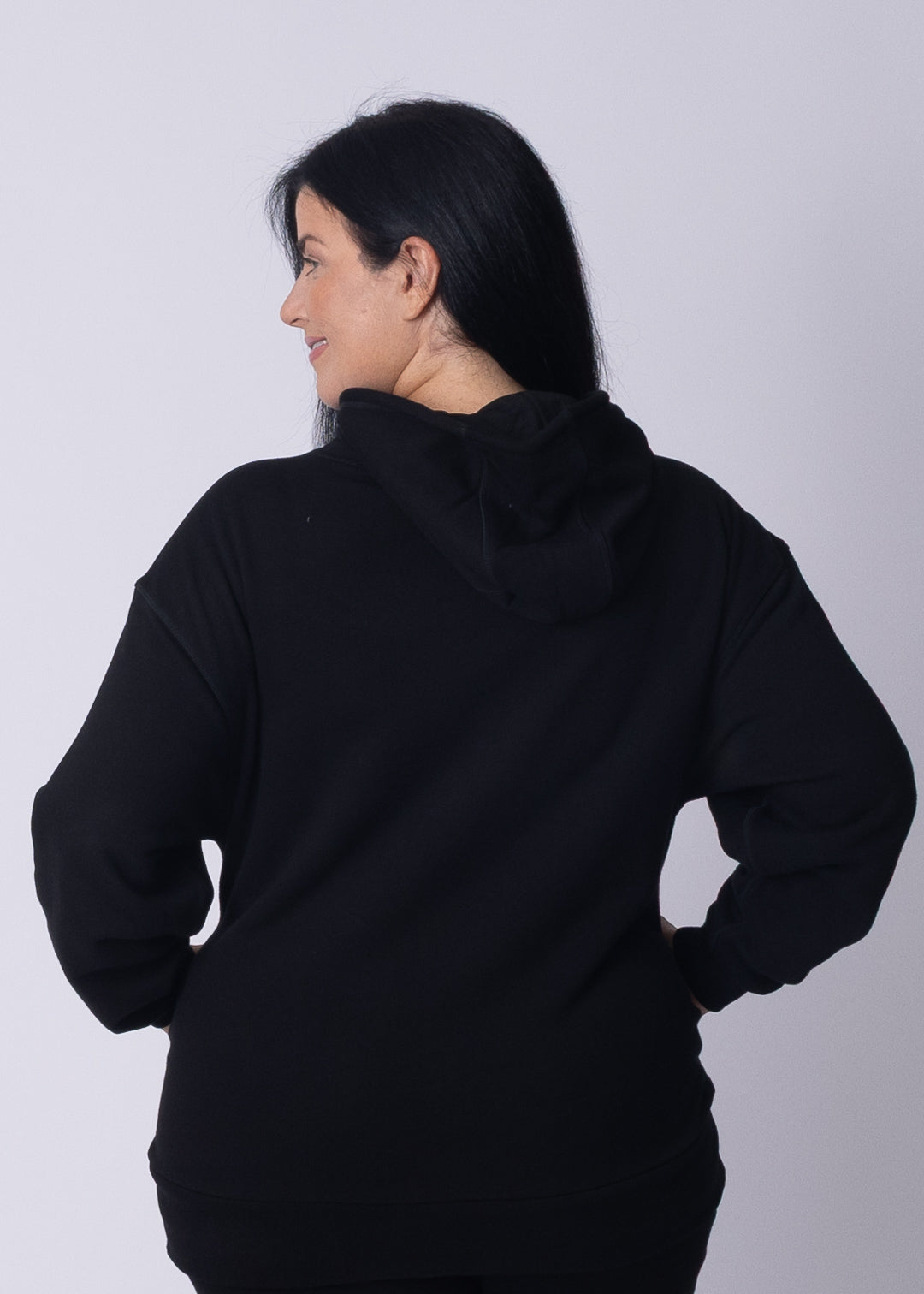 Back view of Moments Cozy Hoodie showing dropped shoulders and oversized fit