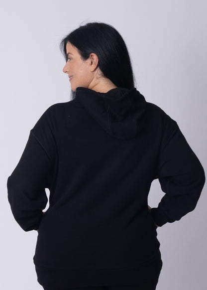 Back view of Moments Cozy Hoodie showing dropped shoulders and oversized fit