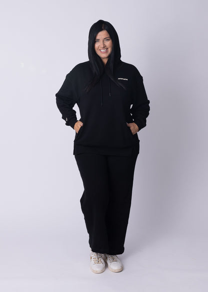 Woman wearing Womene Moments Straight Leg Joggers in Coffee Brown — Australian cotton loungewear